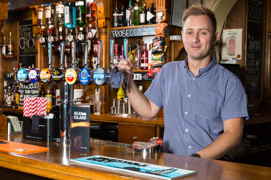 Peter Kray behind the bar at the Crown