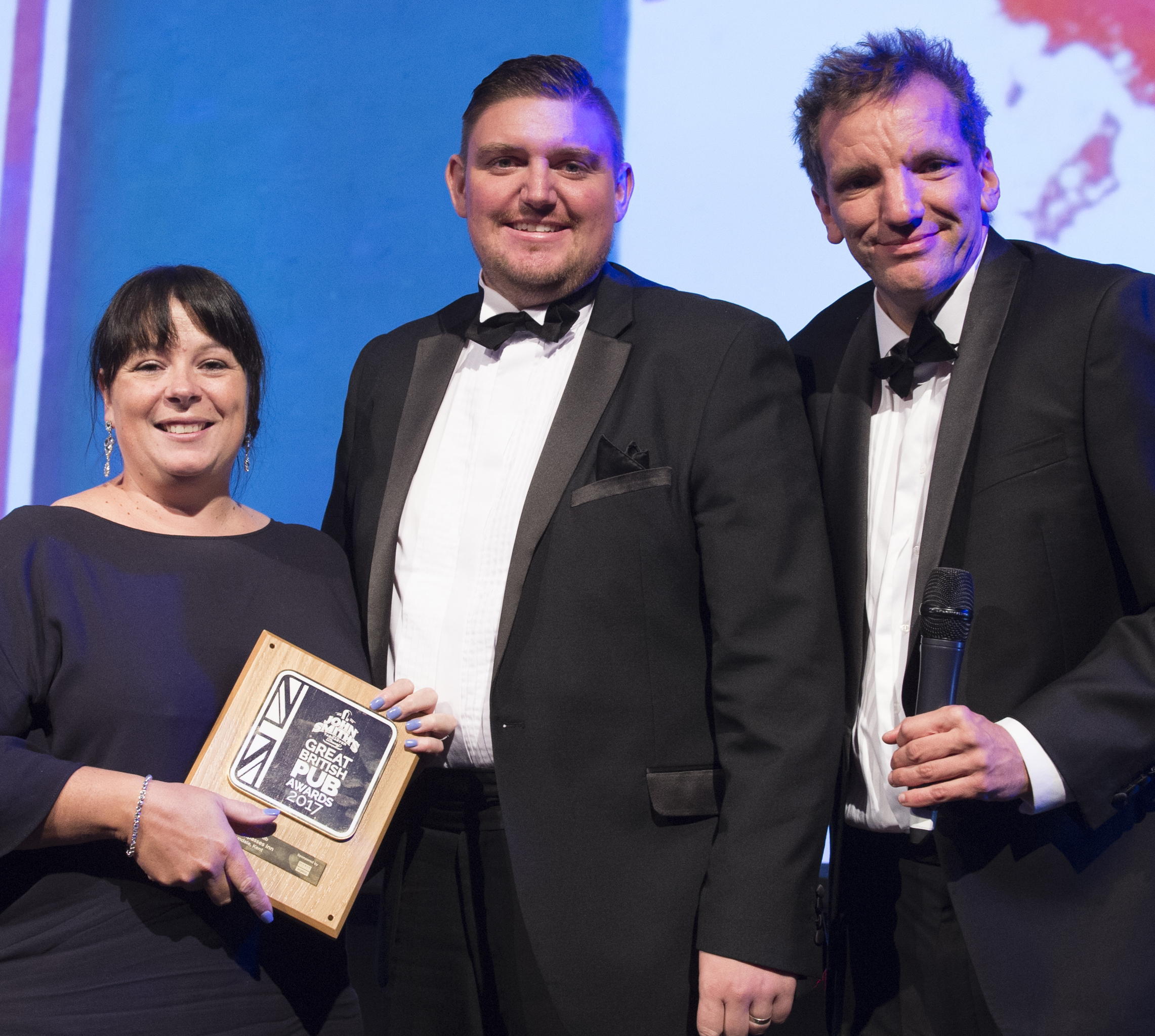 Rob and Donna Taylor at the Compasses, Crundale receiving Great British Pub Award