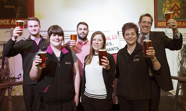 Visitor centre manager Graham Hukins with members of his team