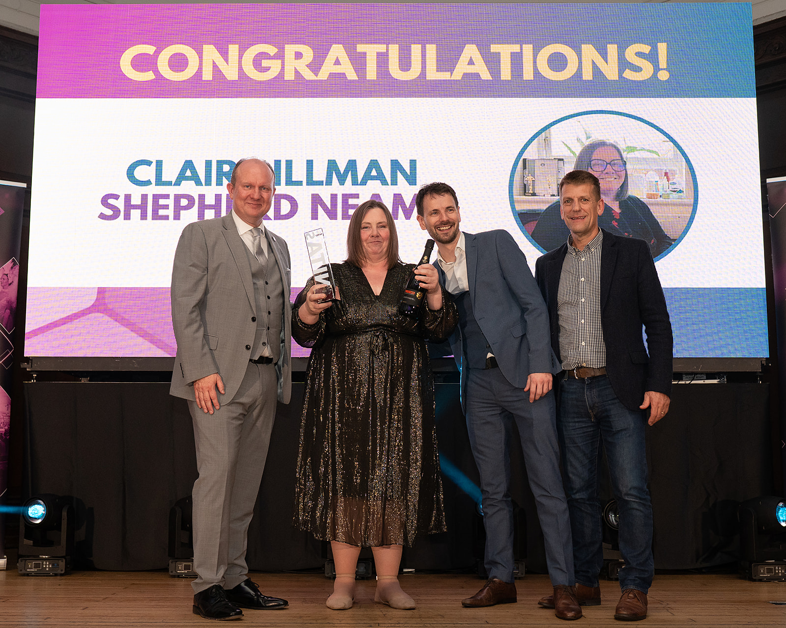 Claire Illman collects her award